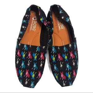 Sketcher’s Bobs Black Dog Print Slip On Shoes